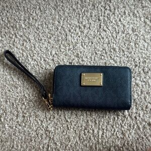 Michael Kors Black Wristlet with Gold Accents;
